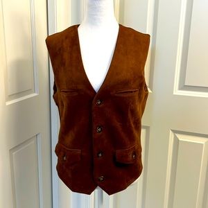 Men’s faux suede vest. Size small. Never worn.